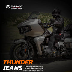 Action shot of a rider wearing men's Kevlar motorcycle jeans, demonstrating the flexibility and protection during a ride.