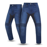 Pair of blue motorcycle jeans with black patches on a white background