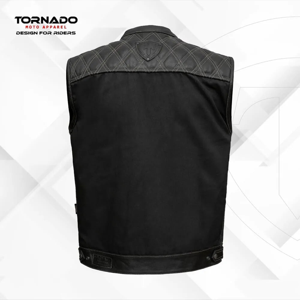 Black motorcycle vest with quilted design on a white background, branded as Tornado Moto Apparel.